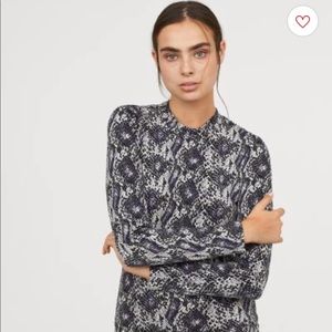 Snake print jersey dress.